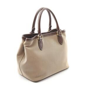 Prada leather brown beige JACQUARD tones canvas handbag LOGO